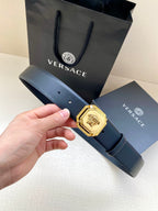 Versace leather belt, dark blue with gold medallion buckle and punched holes