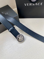 Dark blue leather belt with gold Medusa logo buckle and perforated holes