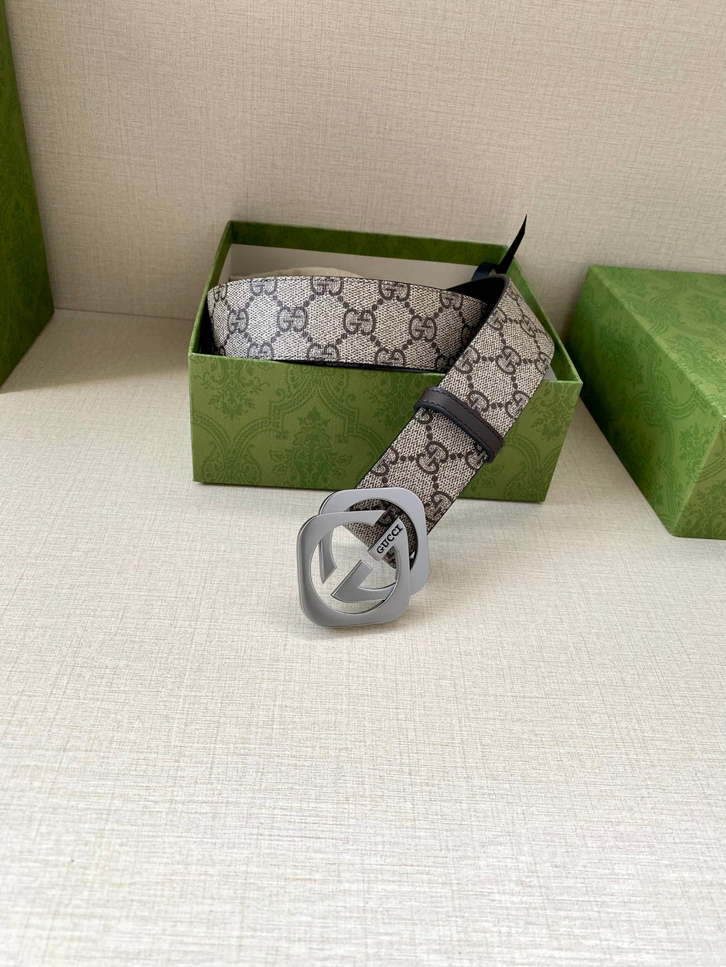 Gucci belt in box with GG canvas strap and silver interlocking G buckle