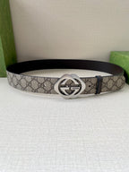 Gucci logo belt with GG canvas strap and silver interlocking G buckle