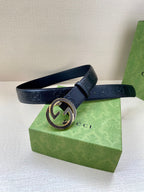 Dark navy belt with Interlocking G buckle on embossed leather strap