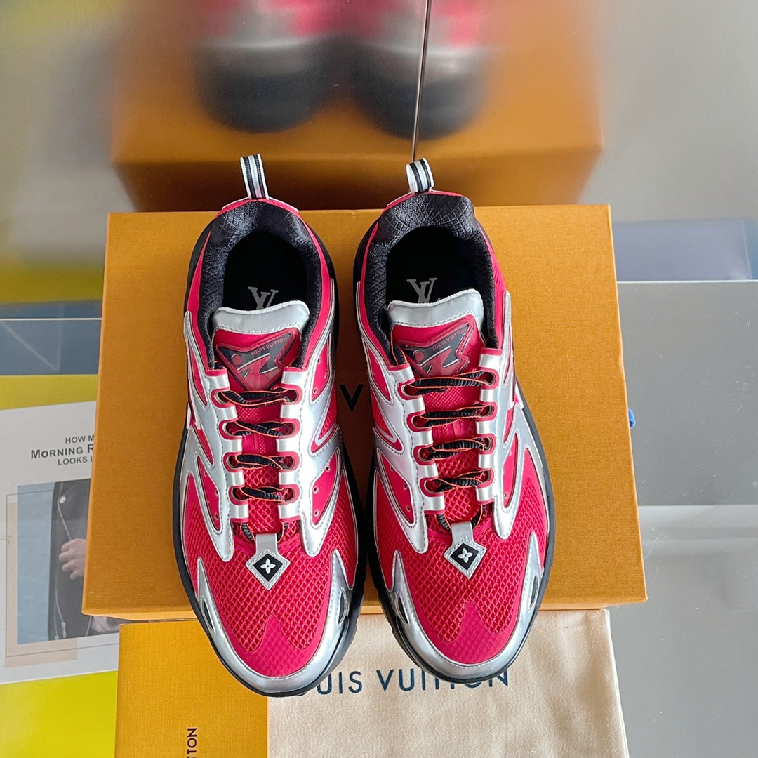 Two Louis Vuitton unisex sneakers front view, pink uppers with silver logos and lace-up
