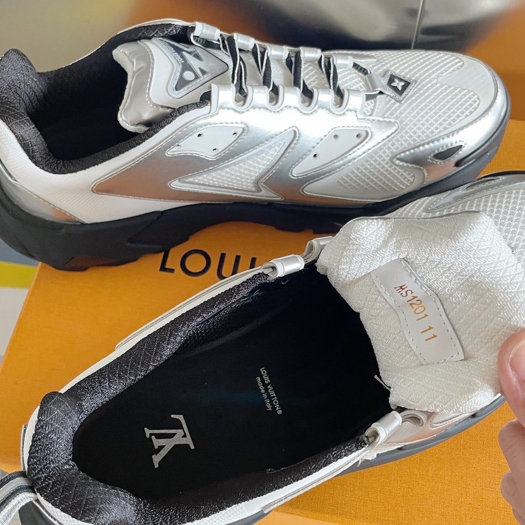 Close-up of Louis Vuitton sneaker interior and laces, white upper with black sole