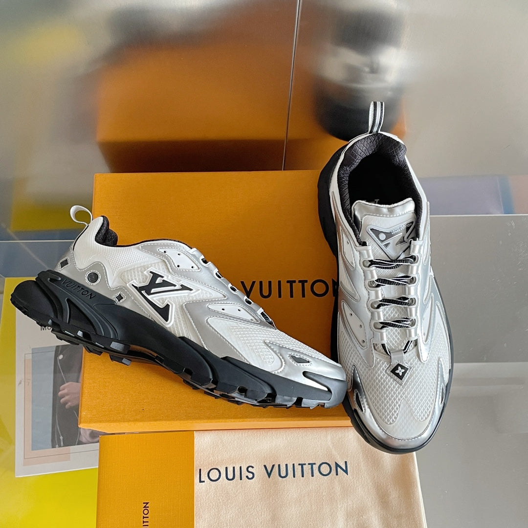 Unisex white-and-gray Louis Vuitton sneakers with black rubber sole, lace-up style