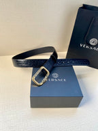 Crocodile-embossed leather belt with gold-tone square buckle on dark blue strap