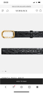 Greca oval belt buckle on dark blue embossed leather strap