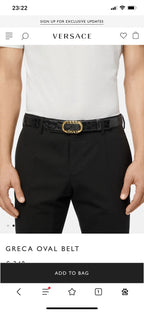 Greca oval belt on black leather strap with gold buckle