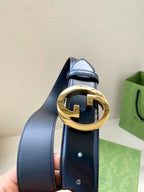 Gucci belt, dark blue leather strap with gold-tone G buckle detail