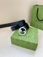 Gucci belt, dark blue leather strap with silver-tone circular G buckle