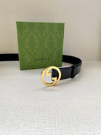 Gucci belt, dark blue leather strap with gold-tone circular G buckle