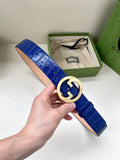 Cobalt blue croc-embossed Gucci belt with gold-tone GG buckle