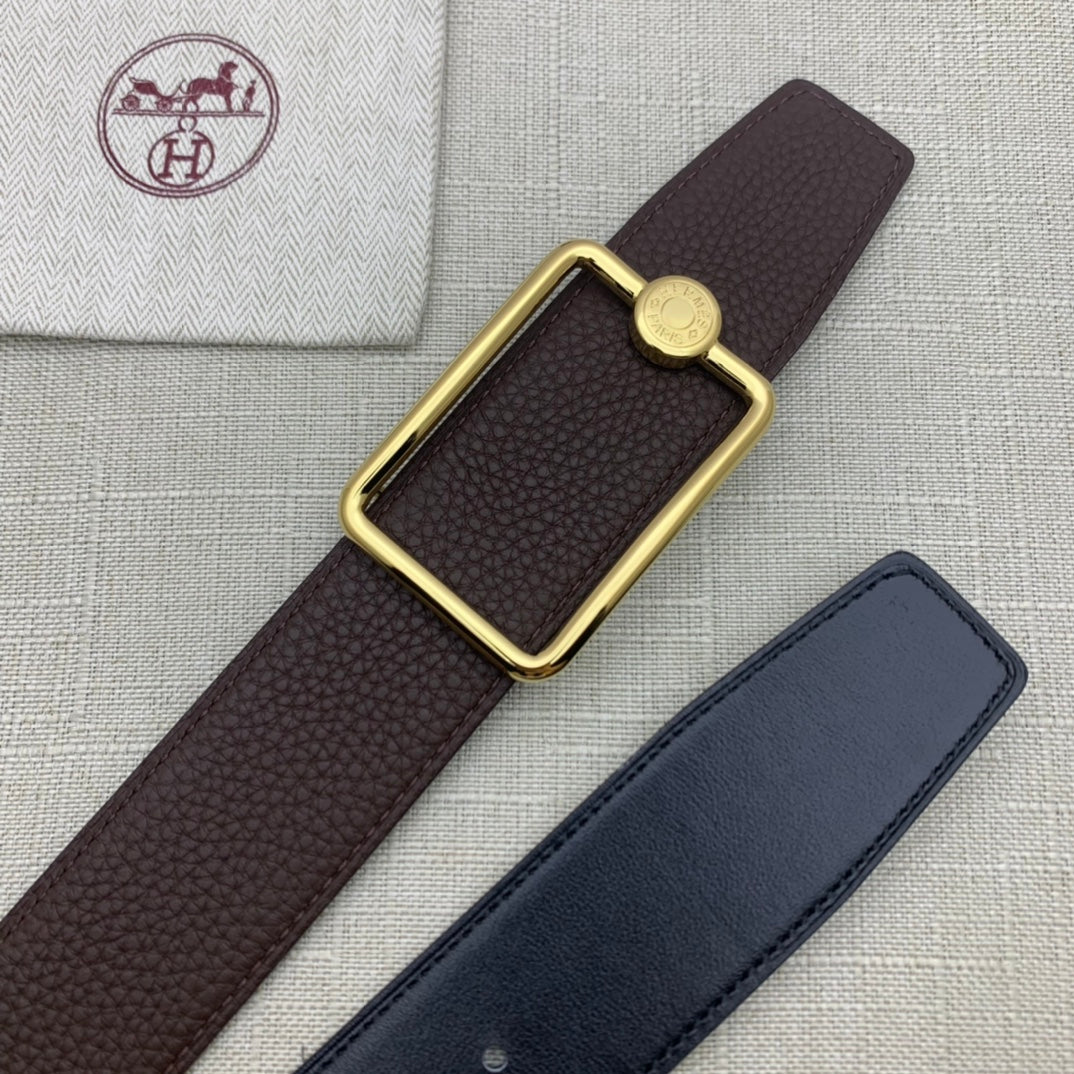 Embossed leather belt with rectangular gold buckle, dark brown strap.