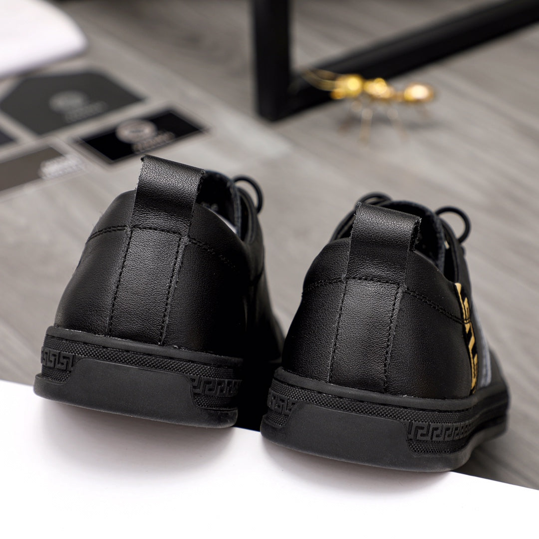 Versace black low-top sneakers with rear pull tab and textured side sole