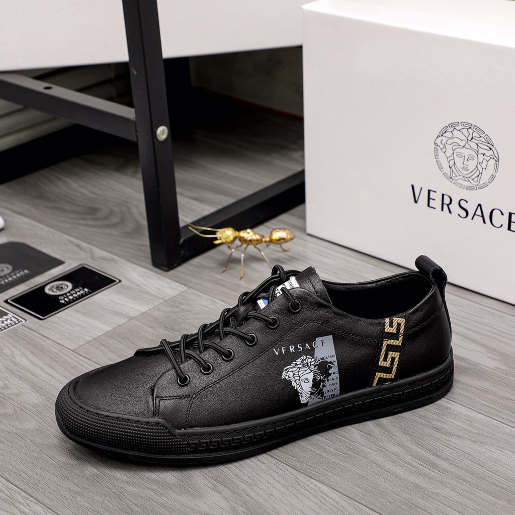 Versace black lace-up low-top sneakers with gold side emblem and small crest patch