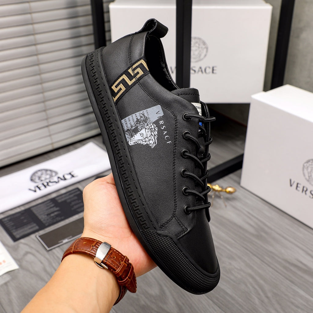 Versace black lace-up high-cut sneakers with gold logo tab and side patch