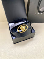 Versace belt in box, dark blue embossed leather with gold-tone oval lion buckle