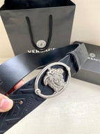 Versace belt, dark blue leather with embossed texture and silver lion crest buckle