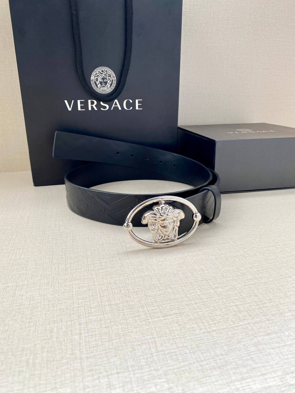 Versace belt, dark blue leather with embossed pattern and silver-tone oval buckle