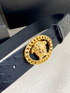 Black belt with embossed pattern and gold-tone Medusa oval buckle