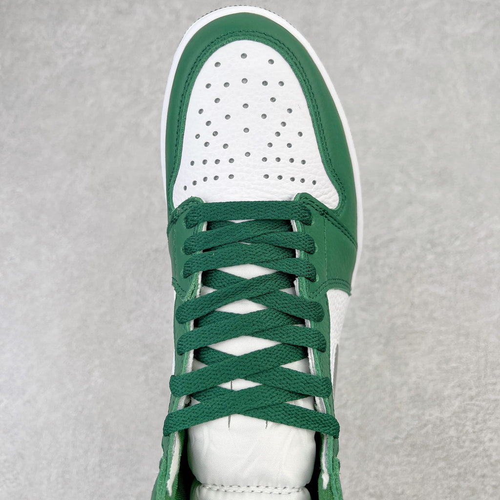 Green and white high-top sneaker with perforated toe and green lace-up front