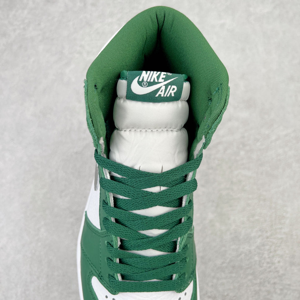 Green high-top sneaker tongue view with Nike Air label and padded white collar