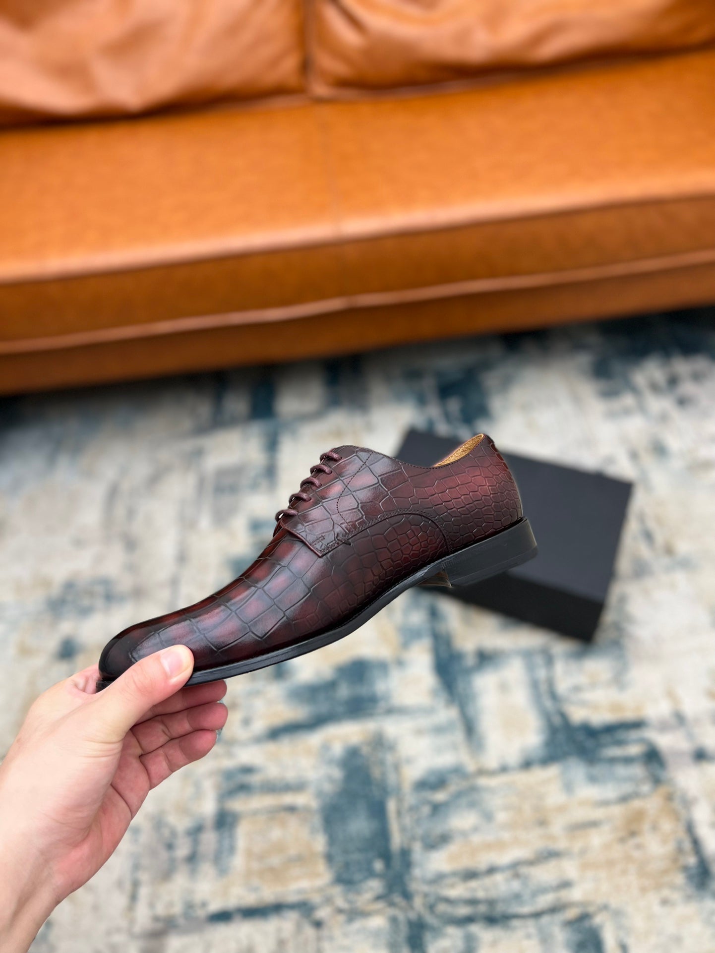 Dior unisex lace-up dress shoe in burgundy crocodile-embossed leather, side view