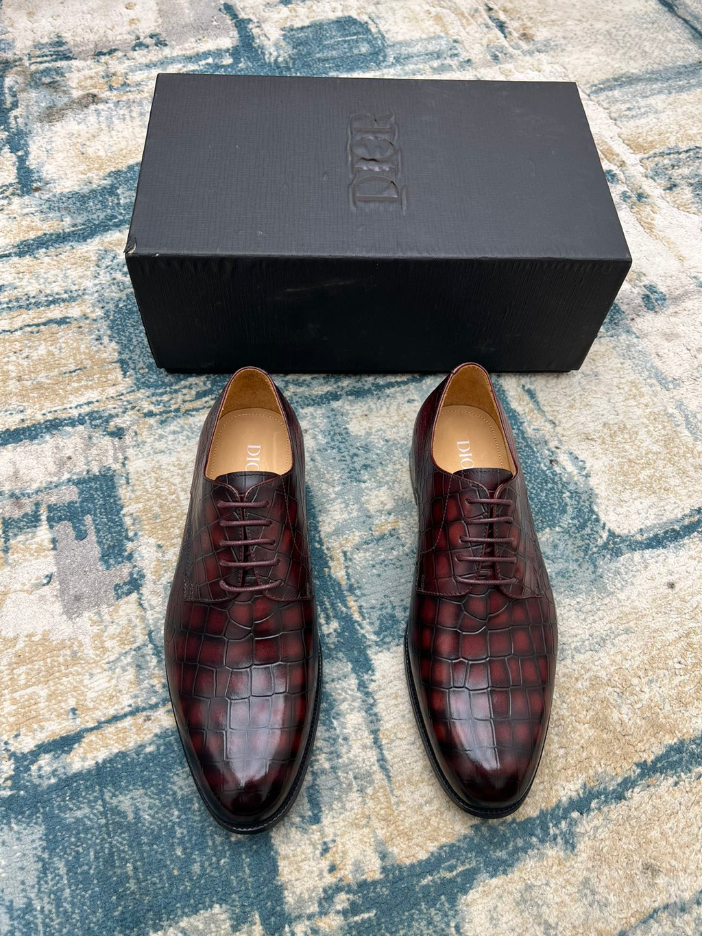 Dior unisex lace-up dress shoes in burgundy crocodile-embossed leather, top view