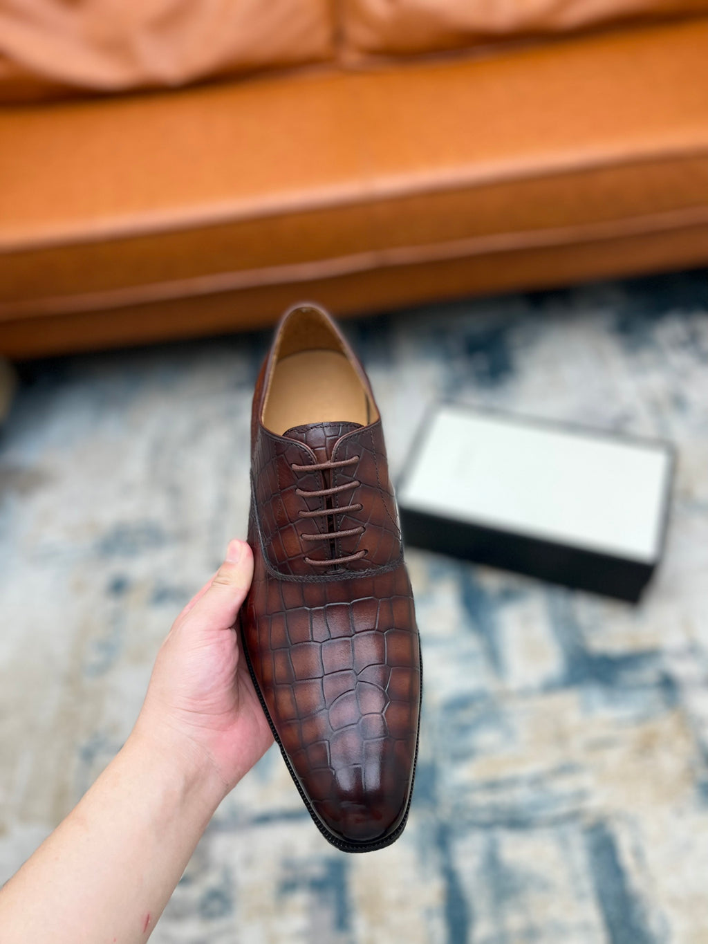 Gucci unisex leather lace-up dress shoe, dark brown textured upper, hand-held front