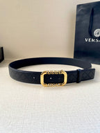 Versace belt in dark blue with subtle monogram pattern and gold-toned buckle