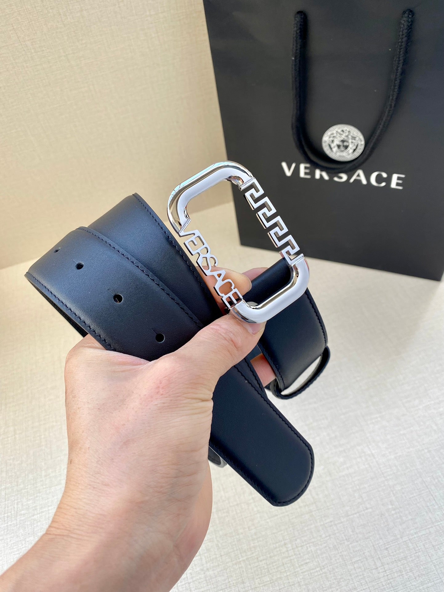 Versace leather belt with dark blue strap and silver-tone buckle with logo emblem