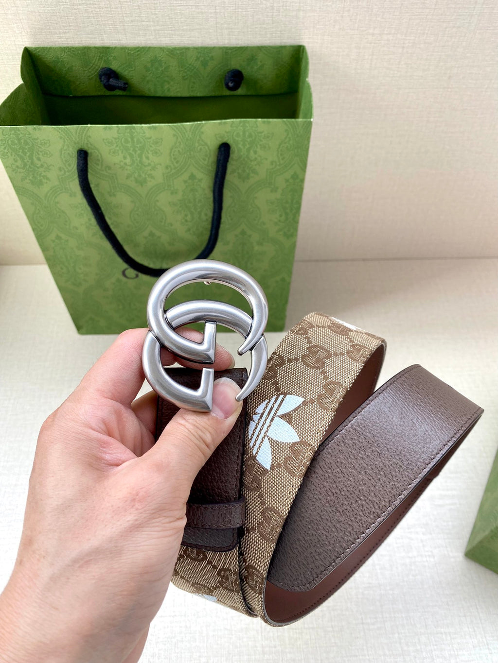 Gucci belt brown leather with GG monogram fabric panel and silver double-G buckle
