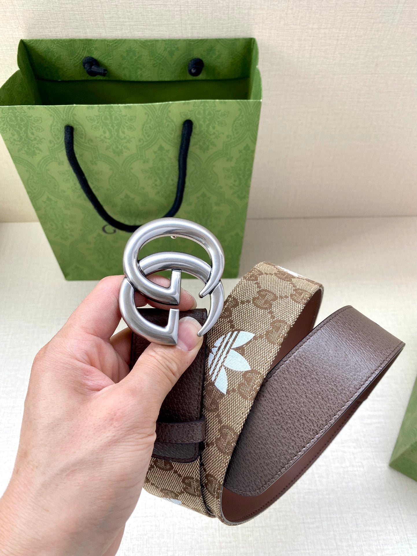 Gucci belt brown leather with GG monogram fabric panel and silver double-G buckle
