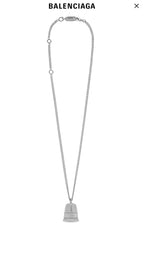 Silver-tone chain necklace with small mesh bell charm and 8B label at base