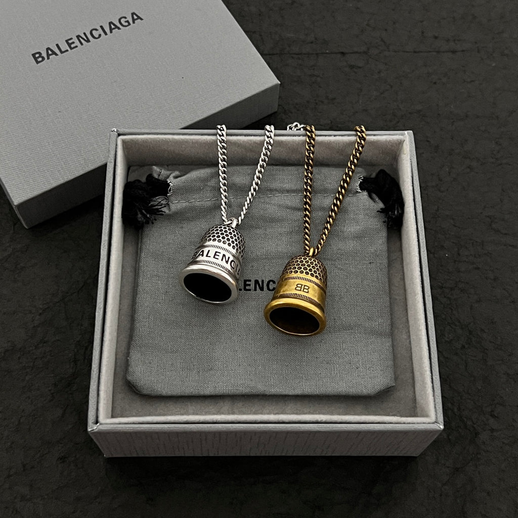 Accessories gift set with two small pendant necklaces in silver and gold tones