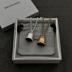Accessories gift set with two small pendant necklaces in silver and gold tones
