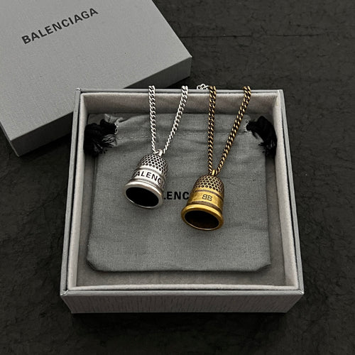 Accessories gift set with two small pendant necklaces in silver and gold tones