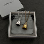 Gold- and silver-tone chain necklaces with mesh bell pendants, in gift box