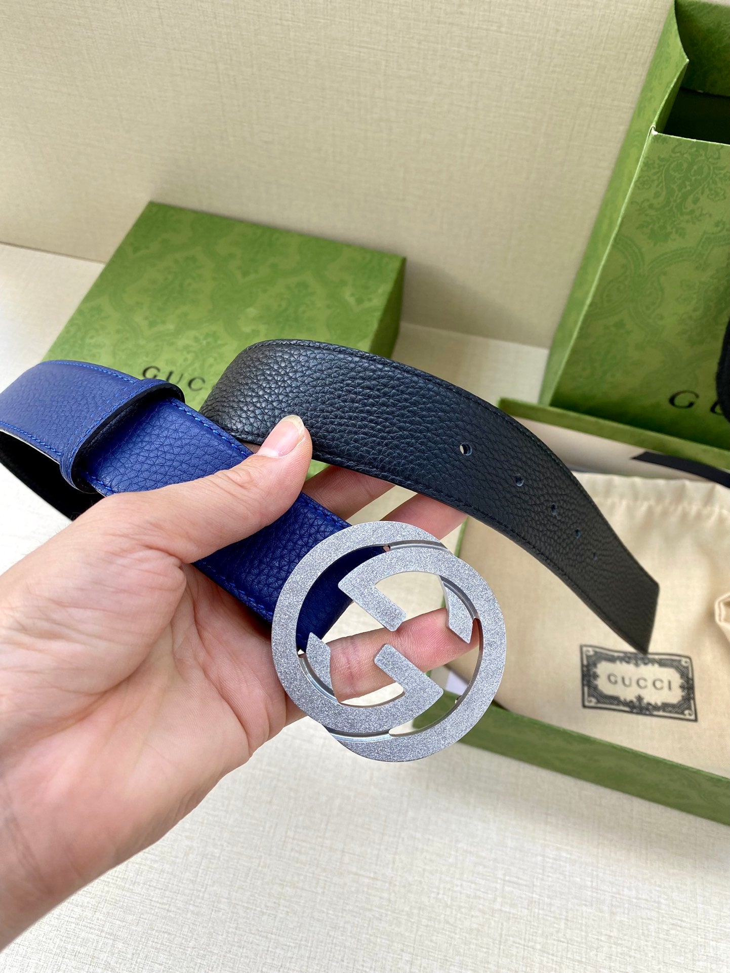 Gucci belt with blue leather strap and silver-tone GG buckle detail