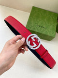 Red leather belt with interlocking G buckle in silver-tone, navy underside visible