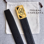 Prada belt with black leather strap, gold buckle, and visible adjustment holes