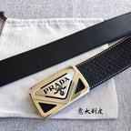 Prada belt buckle and black leather strap with stitched edges, close-up