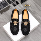 Versace black textured loafers with gold Medusa head and bar detail