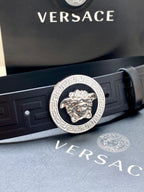 Navy Versace belt with Greca embossed strap and ornate lion emblem buckle