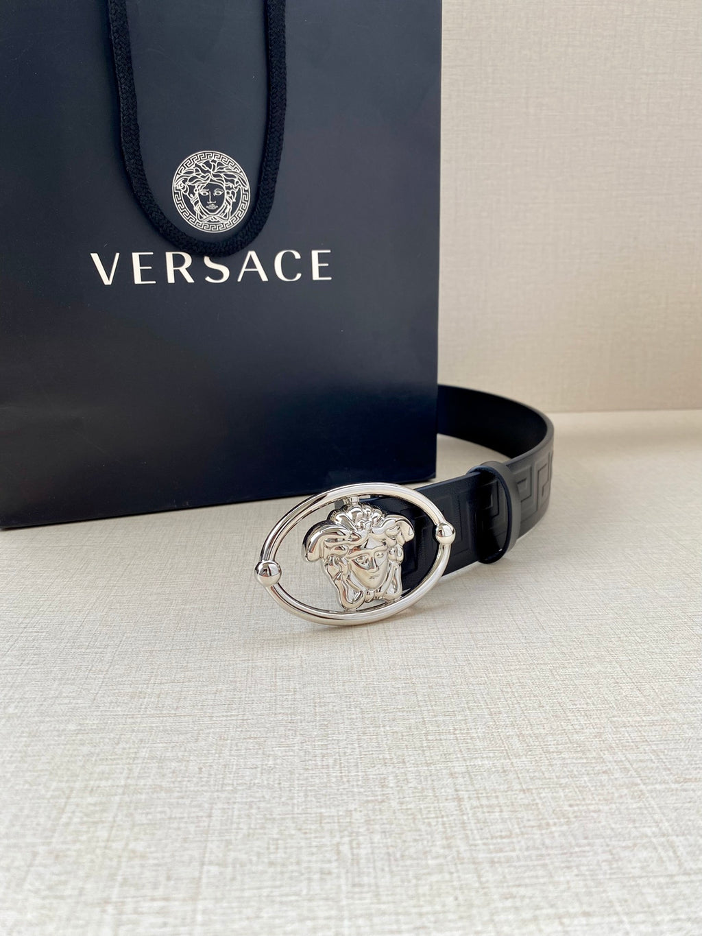 Versace belt in dark navy with embossed pattern and silver-tone oval Medusa buckle