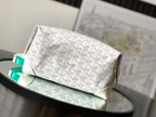 White Goyard monogram clutch bag with zippered top and flap front