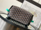 Patterned canvas pouch bag with small logo patch, black leather trim and turquoise pulls
