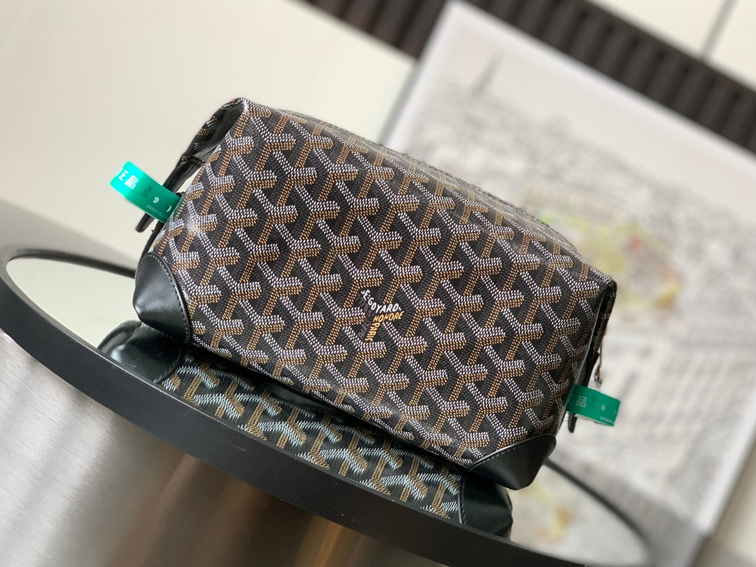 Patterned canvas pouch bag with small logo patch, black leather trim and turquoise pulls
