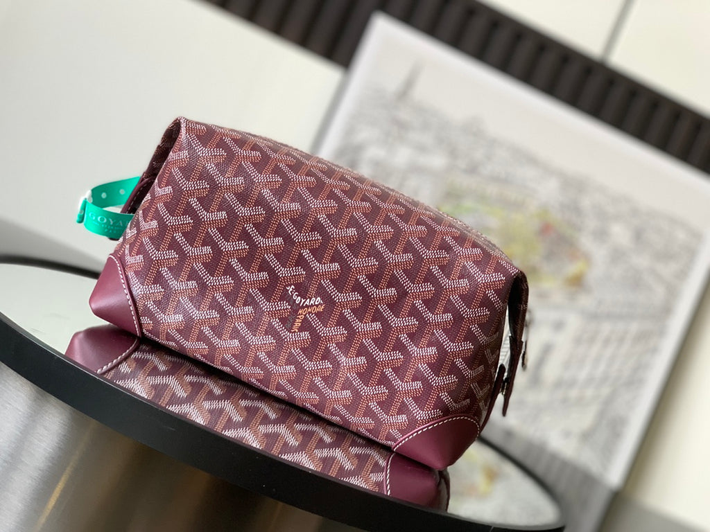 Goyard monogram bag in burgundy patterned canvas with top handle and zip closure