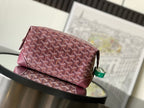 Goyard monogram bag in burgundy patterned canvas with top zip and leather trim