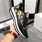 Versace black sneakers with gold baroque side panel and chunky white sole